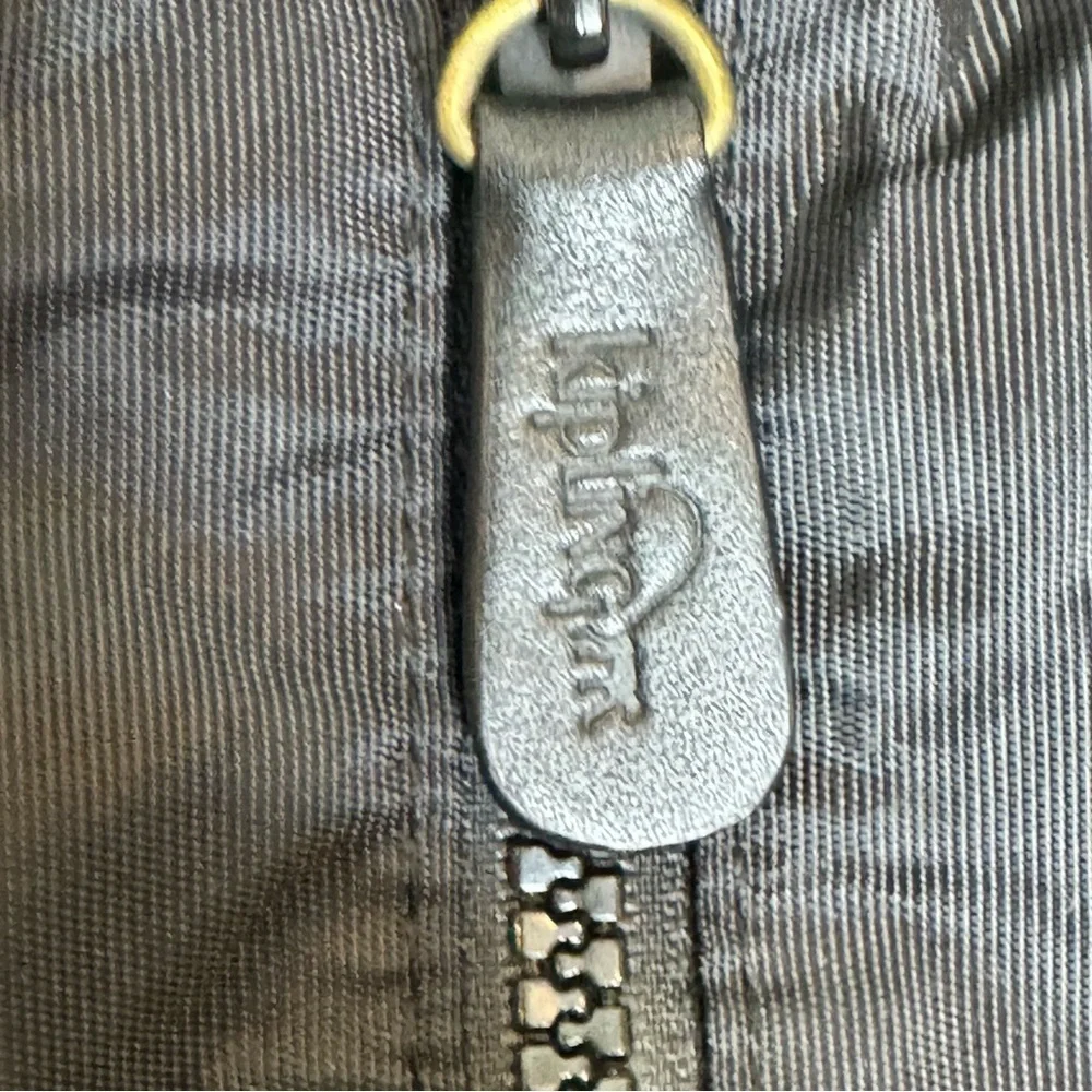 Kipling laptop black briefcase with monkey attached